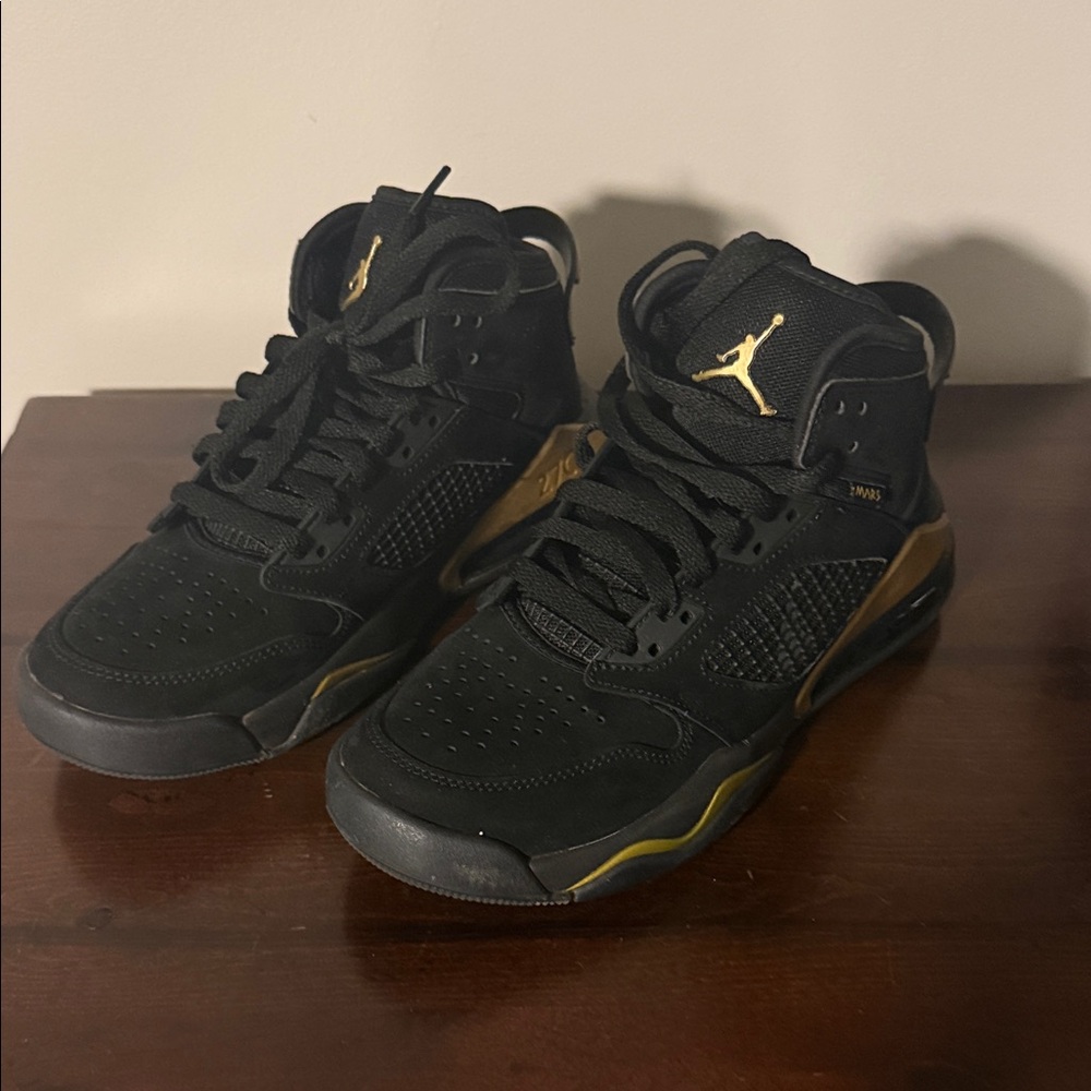 Jordan Black and Gold High-Top Sneakers